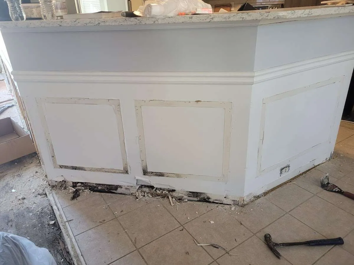 Water damage and mold on kitchen during Storm Damage Restoration in Woodbury